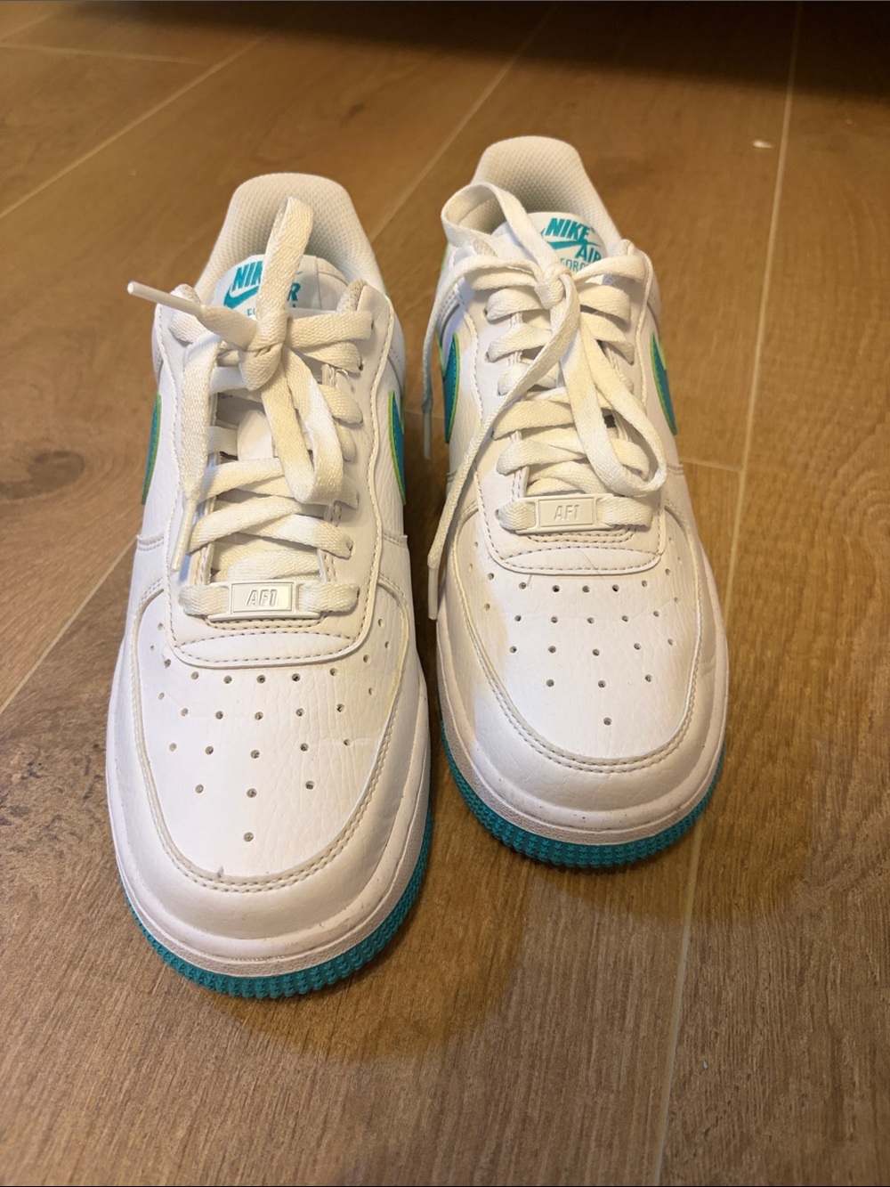 Nike White Sneakers with Teal Accents